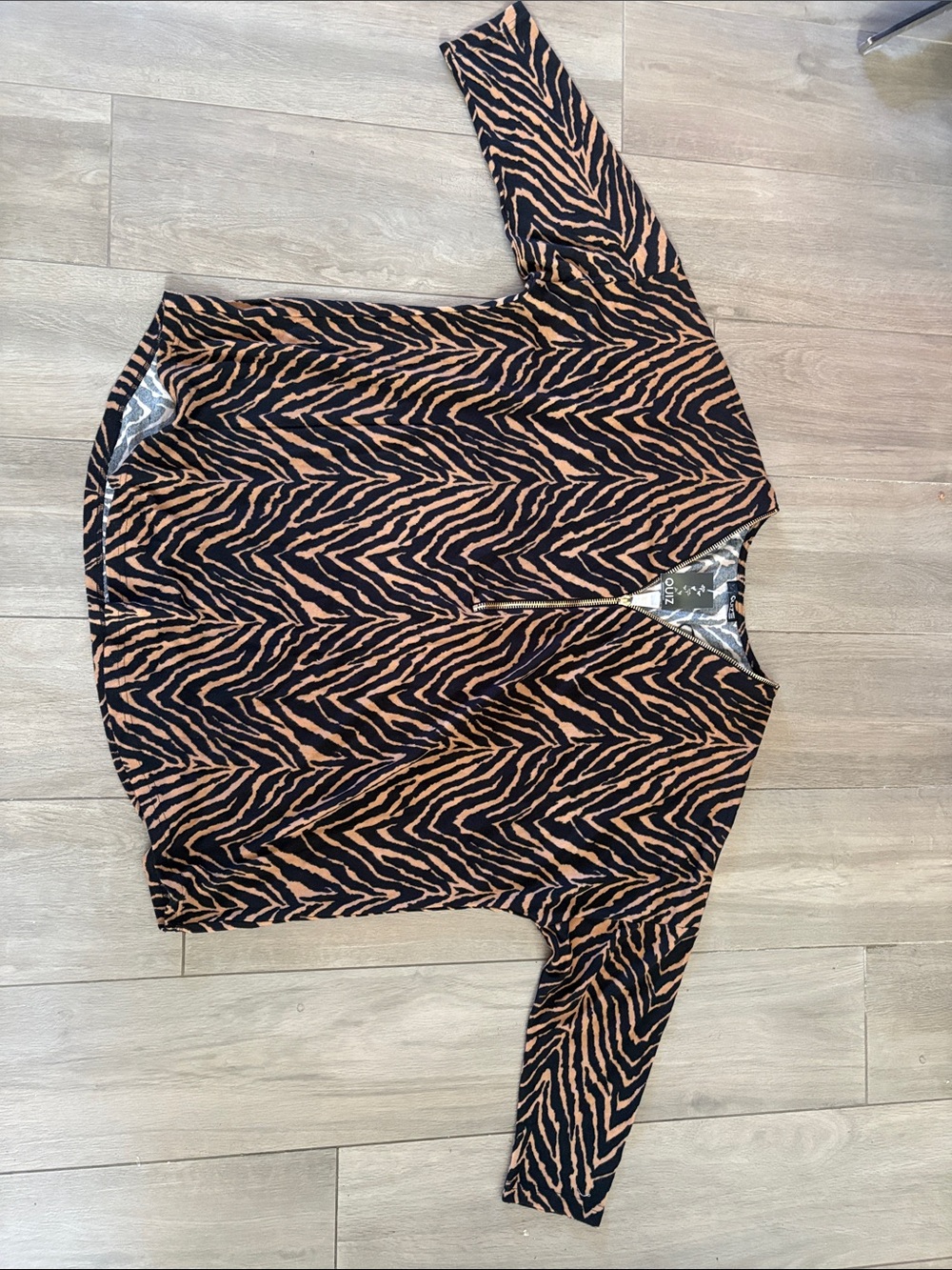 V-Neck Zebra Print Blouse in Black and Tan